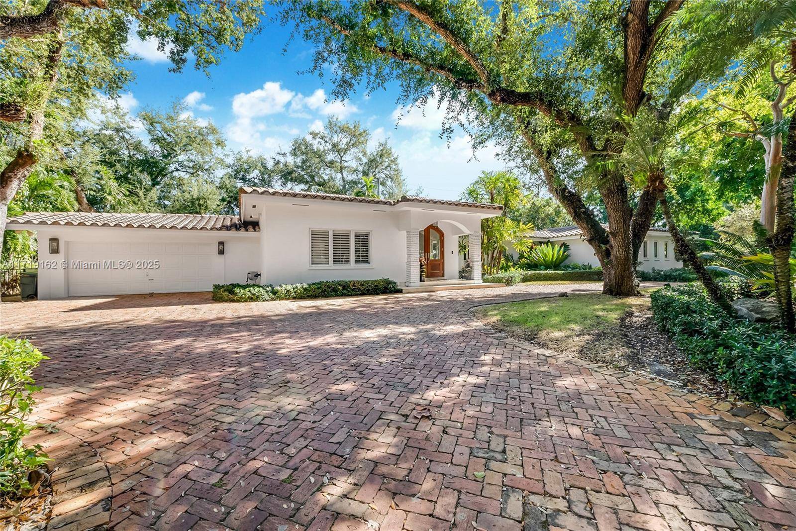 Nestled on a charming tree lined street in Coral Gables, this updated 4, 187 sqft home offers 5 bedrooms, 4.