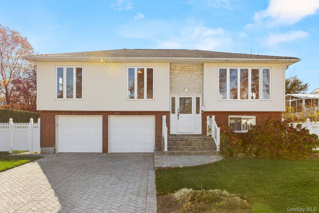Welcome to this spacious high ranch in the heart of Lindenhurst offering the perfect blend of size, flexibility, and location as well as a legal apartment.