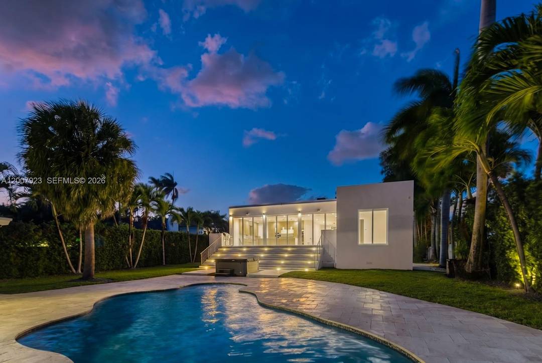 Your private oasis where modern luxury meets serene waterfront living in one of Miami s most desirable enclaves near Davis Harbor.