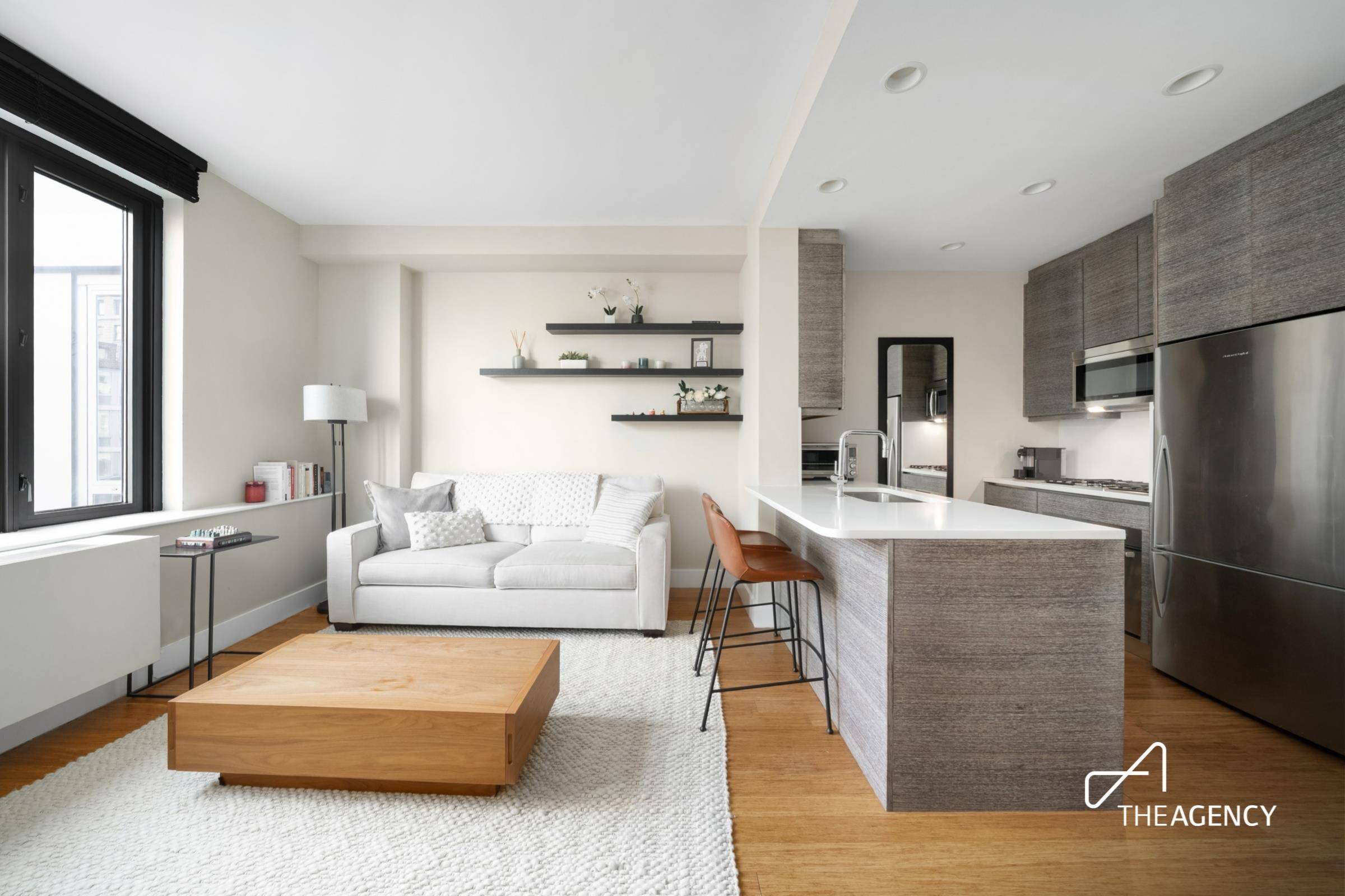 This one bedroom at 305W16 offers bright morning light, quiet interiors, and an iconic Empire State Building viewperfectly framed from both the living area and bedroom.