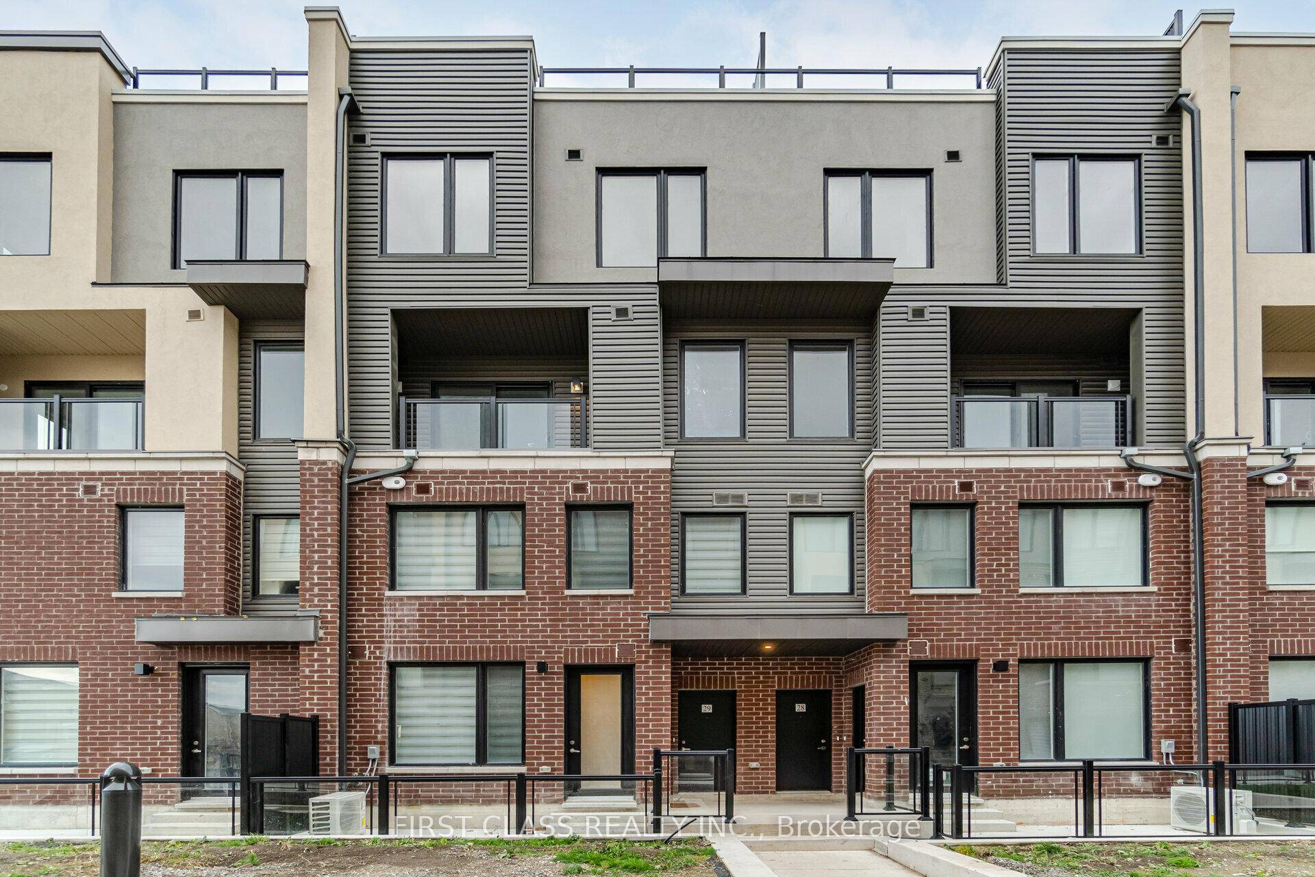Modern 1 year new townhouse offers open concept design with large windows with natural light.
