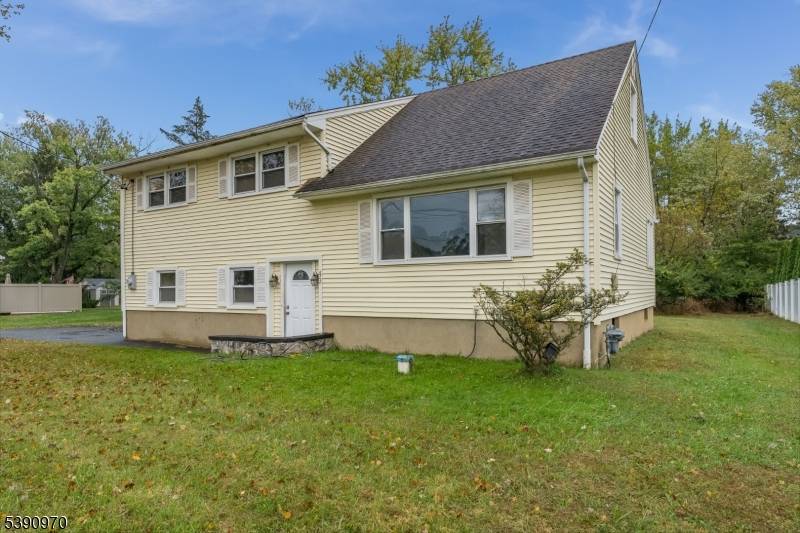 Located in the highly regarded Hillsborough School District, this beautifully cared for split level home sits right in the heart of town, offering a warm, flexible layout.