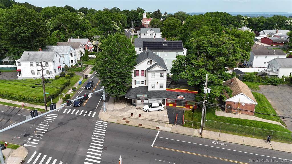 Welcome to 1485 Corbin Avenue a well maintained and highly visible mixed use building offering the perfect blend of commercial and residential space in a prime New Britain location.