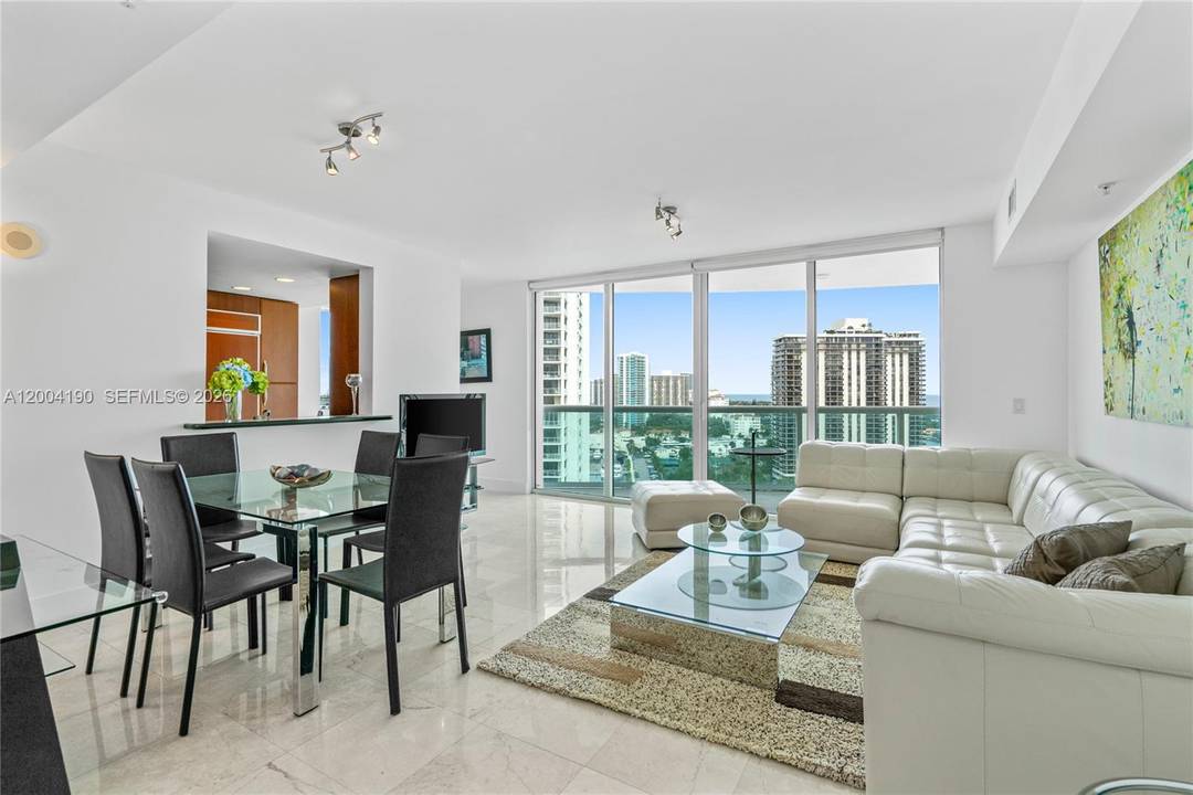 Beautiful 2 bedroom den easily used as a 3rd bedroom residence in one of Aventura s most desirable buildings, featuring spectacular ocean and Intracoastal views.