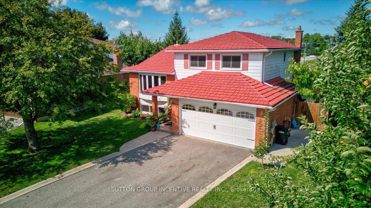 Perfectly situated on a quiet, family friendly street lined with mature trees, this updated 4 bedroom, 2.