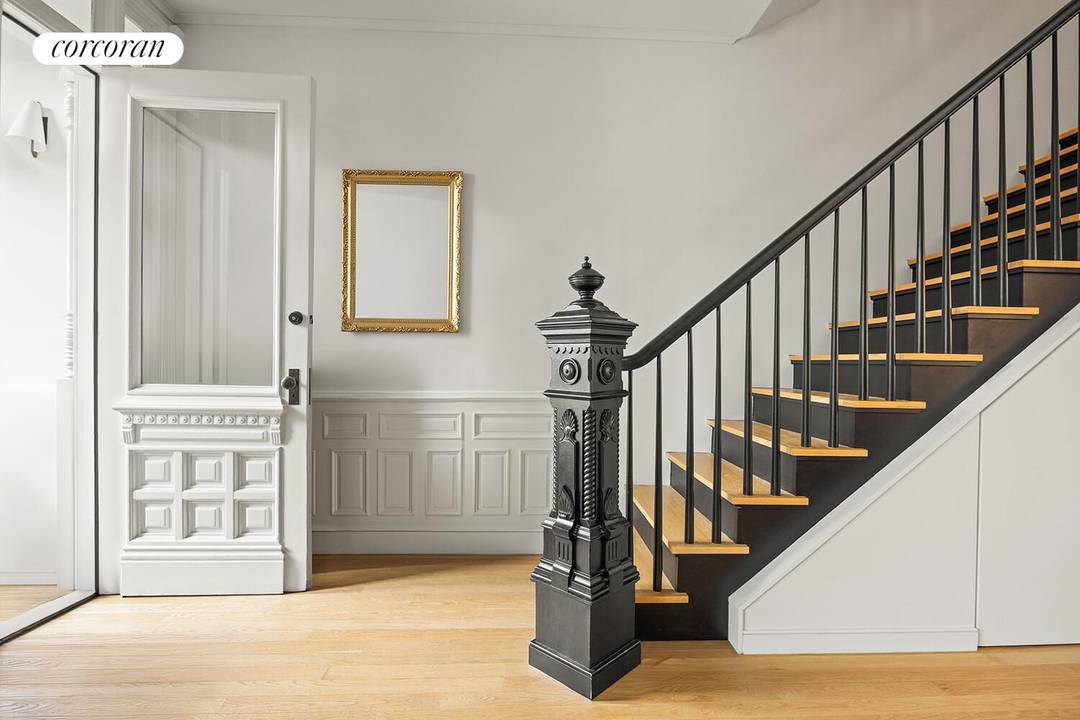 Set on one of Park Slope's most beloved leafy blocks, this rare fully renovated four story, 20 foot wide townhouse features notable scale and high end finishes throughout.