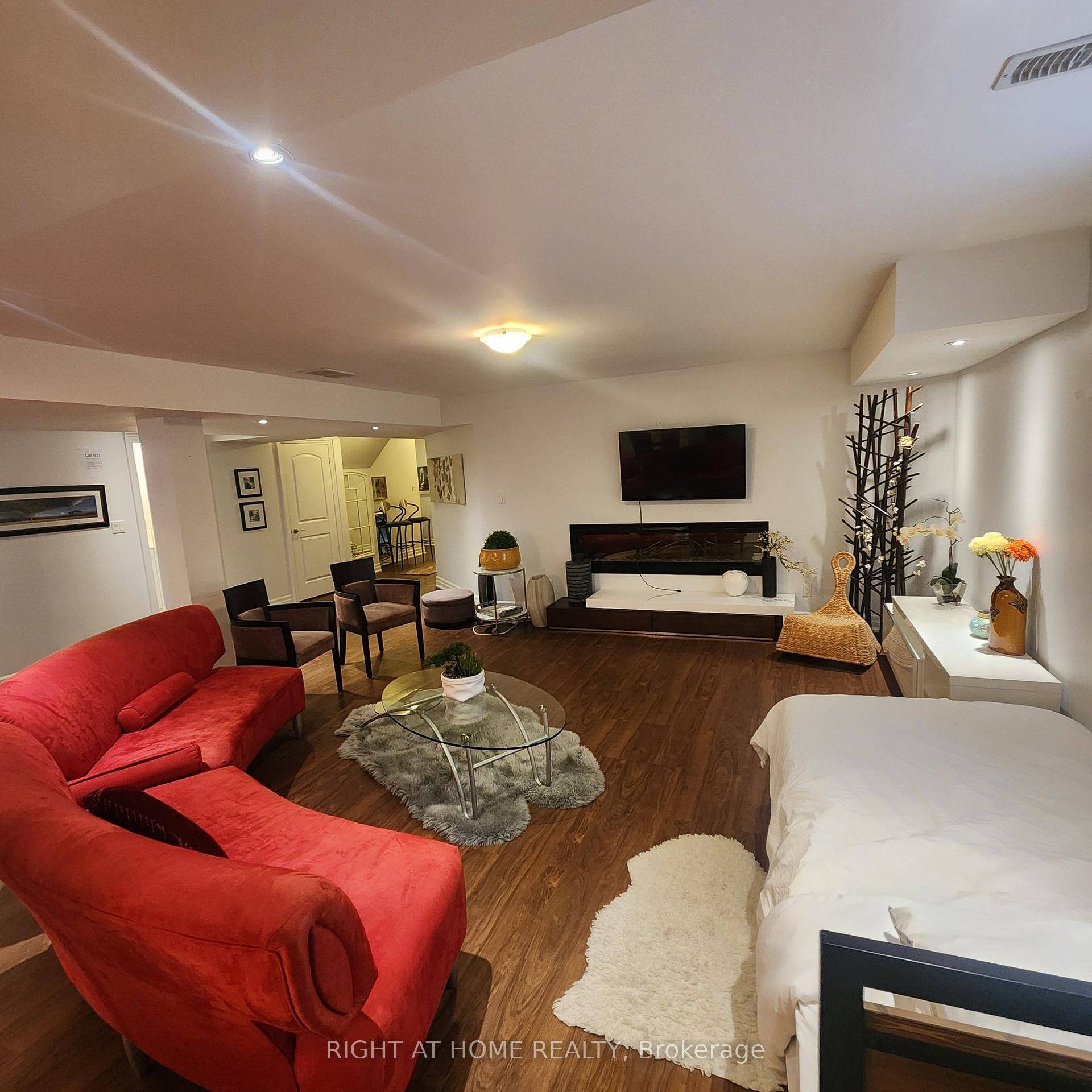 This spacious and beautifully designed basement apartment offers over 1, 000 sq.