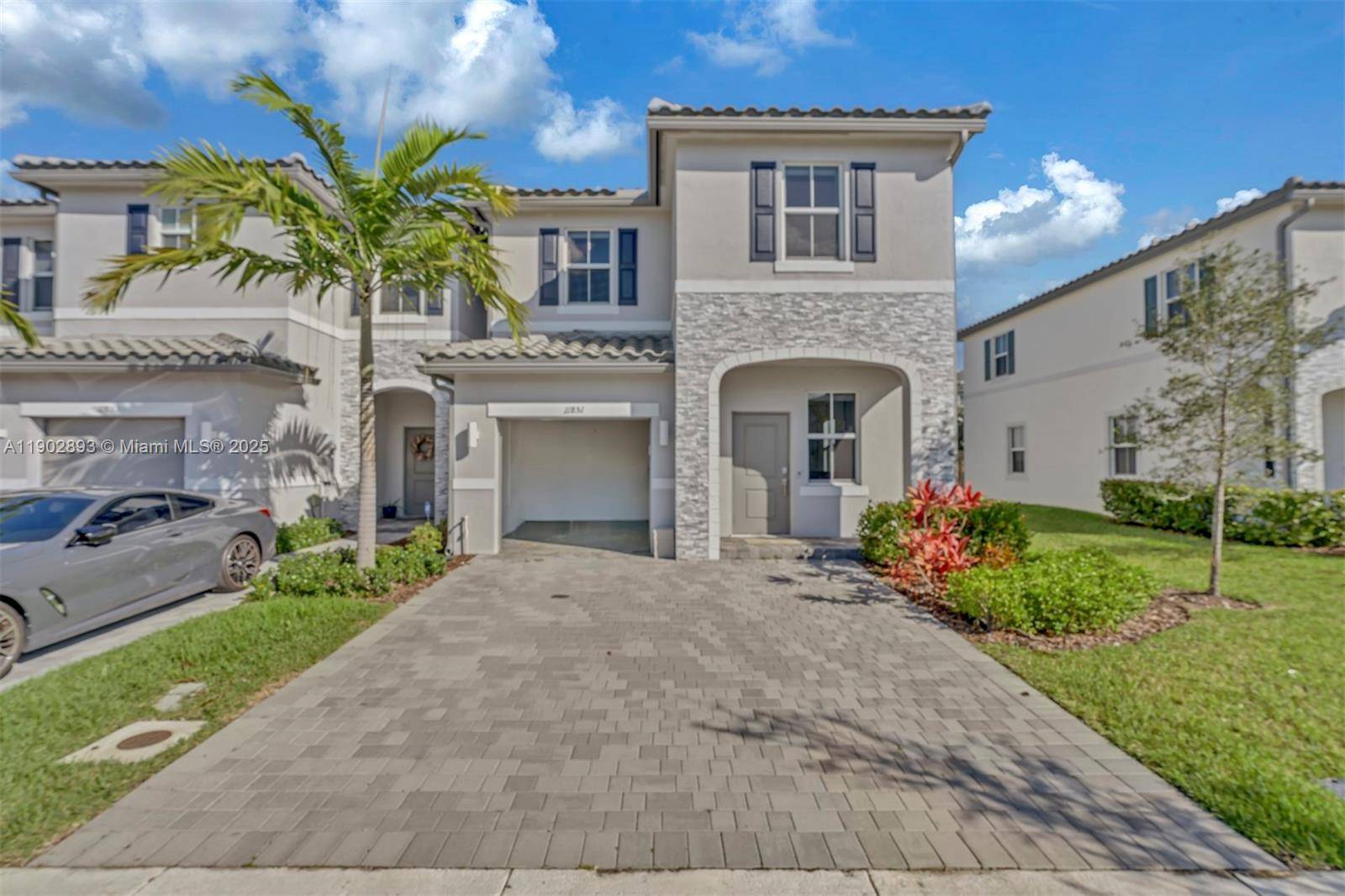Stunning corner unit 4 bedroom, 3 bath townhome in the highly desirable gated community of Sunset Trails, Coral Springs !