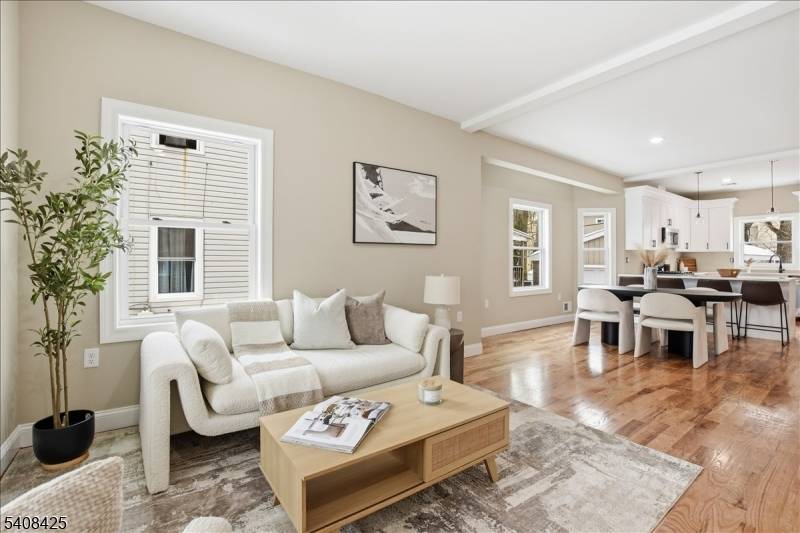 Stunning New Build Construction Side by Side Two Family Duplex, Showcasing refined design, upscale finishes, and expansive living across every level.