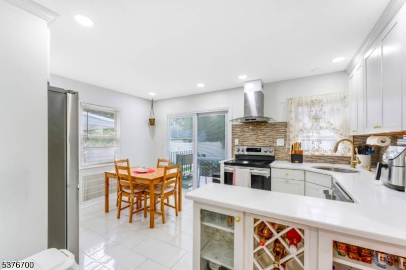 Rahway's Most Desirable Location, We're proud to present this beautifully updated, move in ready home nestled on a quiet residential street just steps from the Woodbridge border.