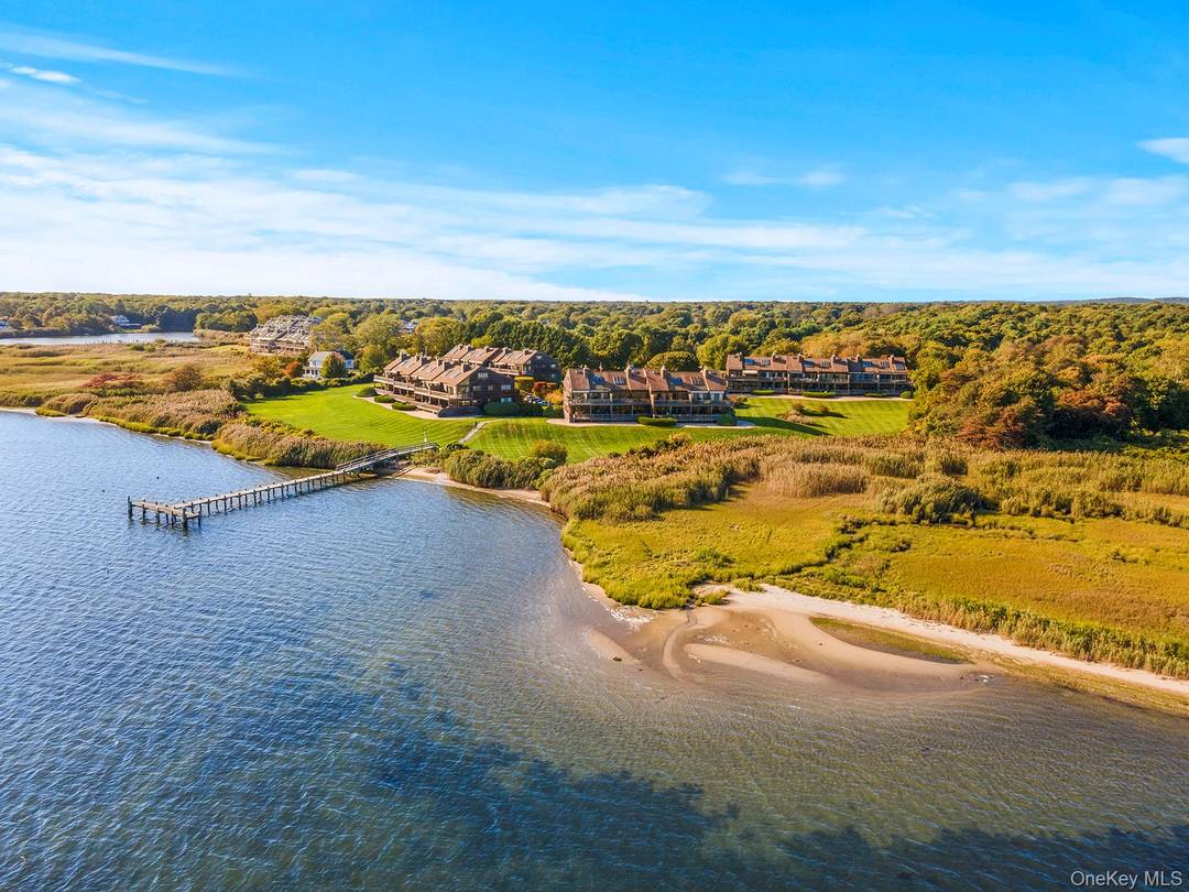 A WATERFRONT UPPER END UNIT RENTAL Villas on the Bay, a very sought after community sited on the quiet waters of Harts Cove with magnificent vistas onto Moriches Bay and ...
