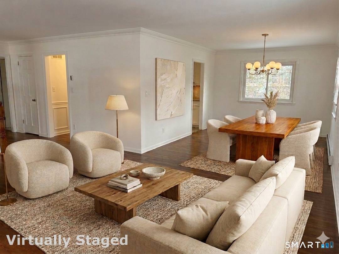 This spacious 4 bedroom, 3 full bath raised ranch offers a perfect blend of comfort and style with beautiful river views from multiple vantage points.