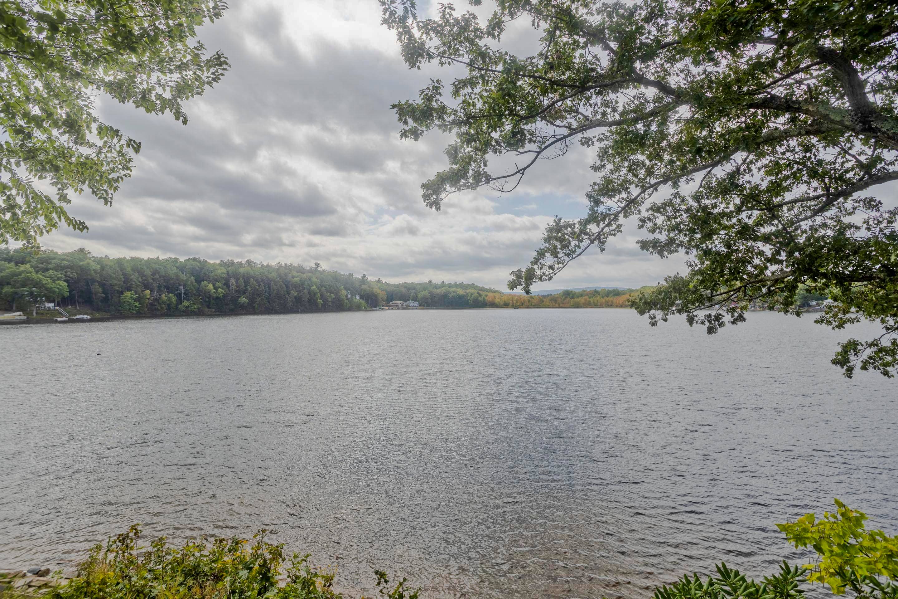 Modern contemporary sitting on 200ft of waterfront beauty on the South Pond leg of Congamond Lakes.