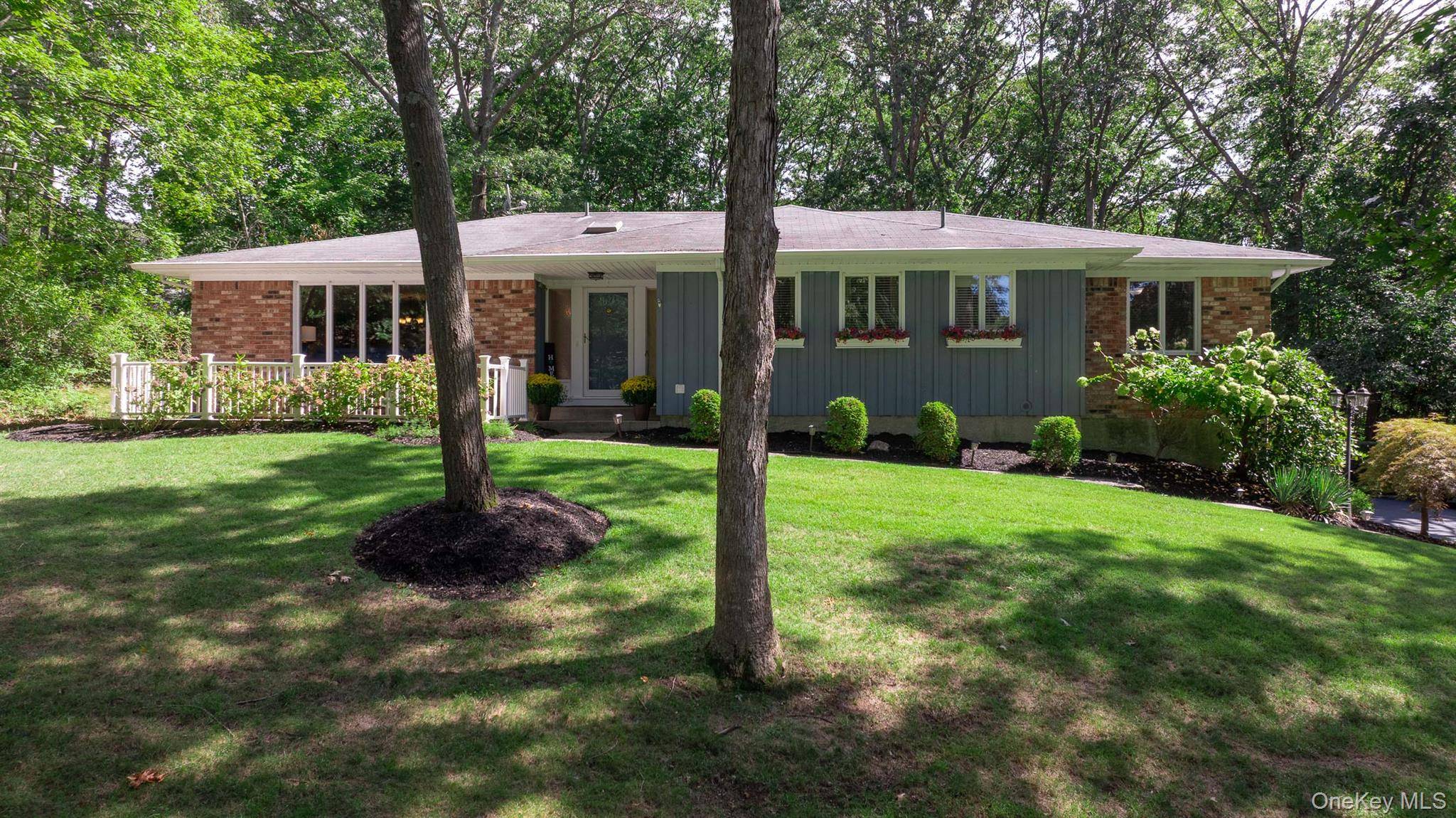 Welcome to 4 Burham Court located on a private Cul De Sac in the heart of North Smithtown.