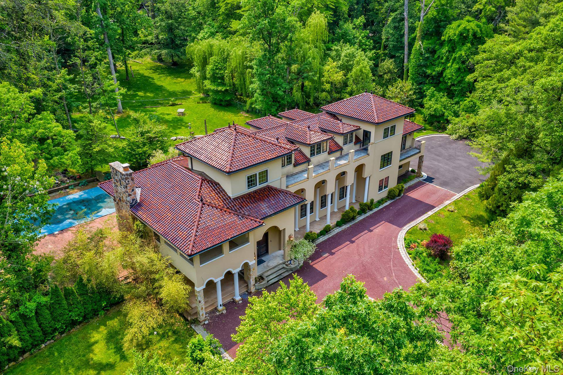 This stunning custom built Mediterranean estate, rebuilt in 2006, offers a luxurious retreat designed for relaxation and elegant entertaining.