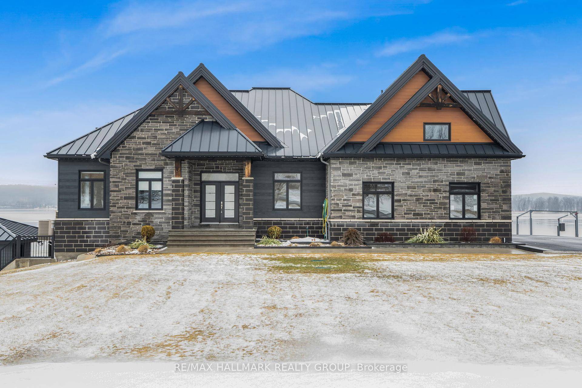 Welcome to 3795 Concession 1 Road ; Built in 2017, this immaculate 5 bedroom, 3 bathroom custom WATERFRONT bungalow with radiant heated triple car garage amp ; walkout basement is ...