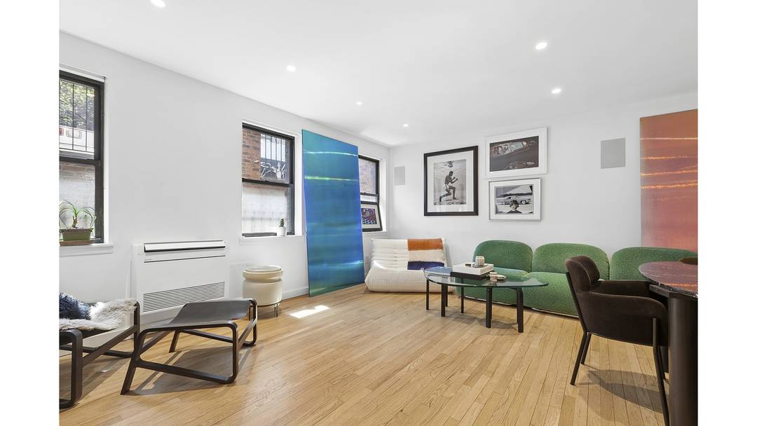 RENOVATED, SUN FILLED SPLIT LEVEL LOFT WITH SOUTHERN EXPOSURES AND PRIVATE GARDEN ACCESS EXCELLENT STORAGE AND A FLEXIBLE HOUSE LIKE LAYOUT IN THE HEART OF DOWNTOWN Residence 1B at 200 ...