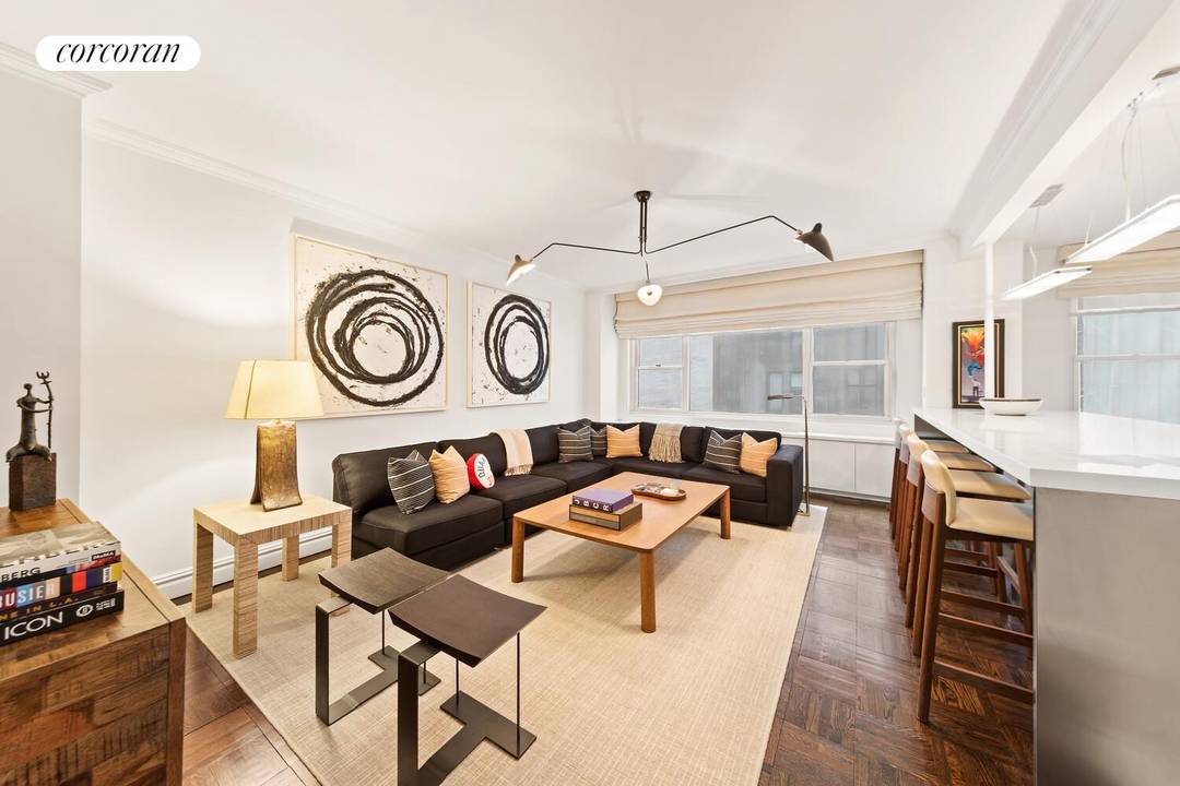 Experience the epitome of sophisticated urban living in this distinguished cooperative, Residence 7E on Fifth Avenue's Upper East Side.