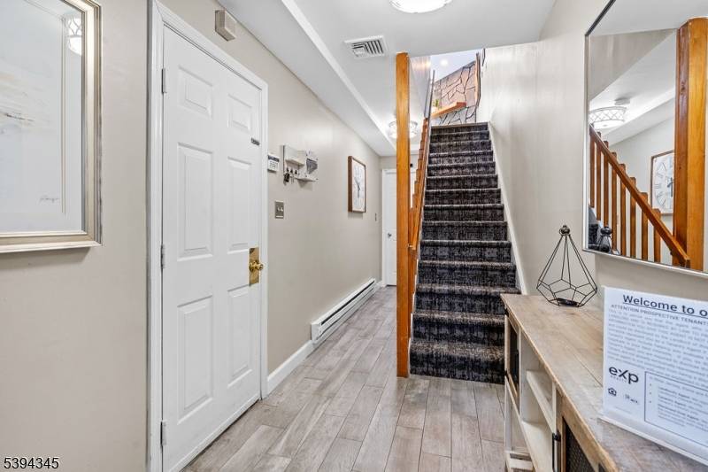 Welcome to this spacious 4 bedroom, 4 bathroom townhouse in fabulous condition, featuring a modern quartz kitchen, updated bathrooms, and a bright, open living area with a cozy fireplace.
