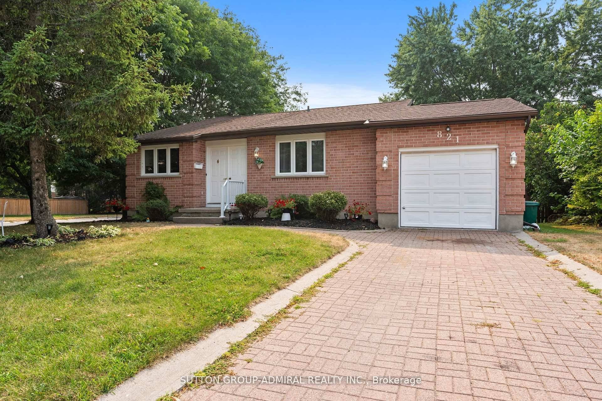 Rarely offered corner bungalow in West Woods Bayridge neighborhood.