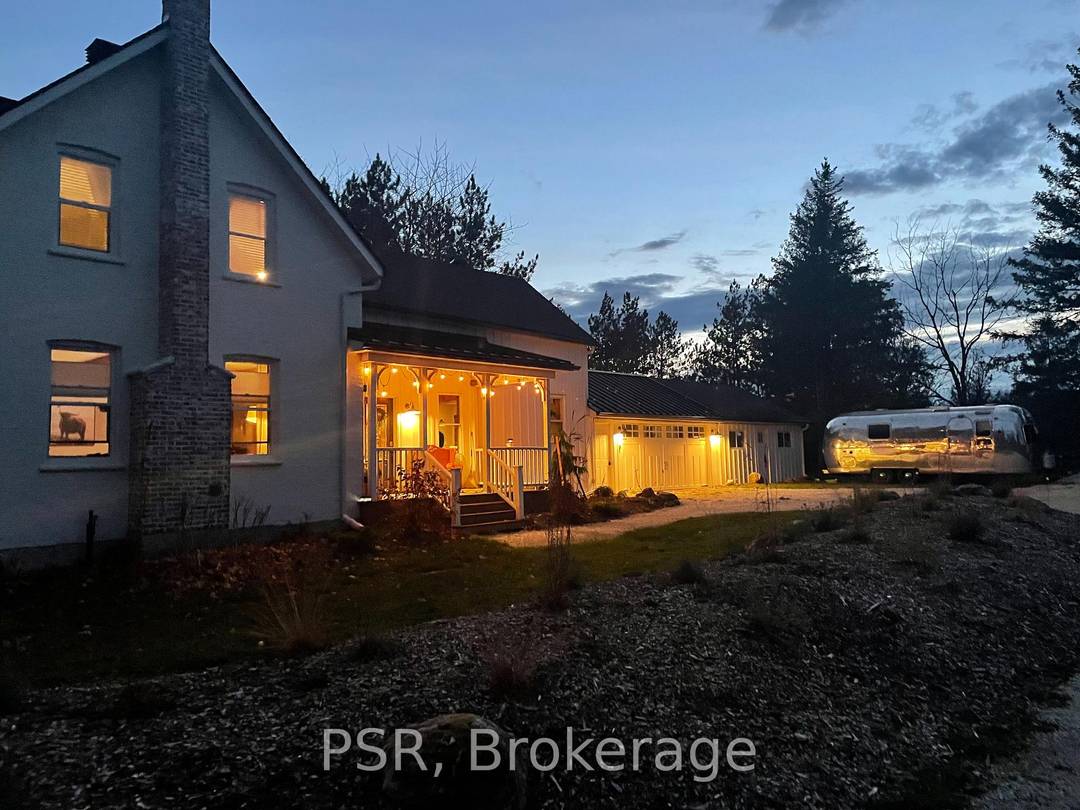 This beautiful, secluded 5 bedroom farmhouse with attached garage, outdoor firepit, sauna, family room fireplace, huge party kitchen, bonus office nursery bedroom sitting on 20 serene acres is just a ...