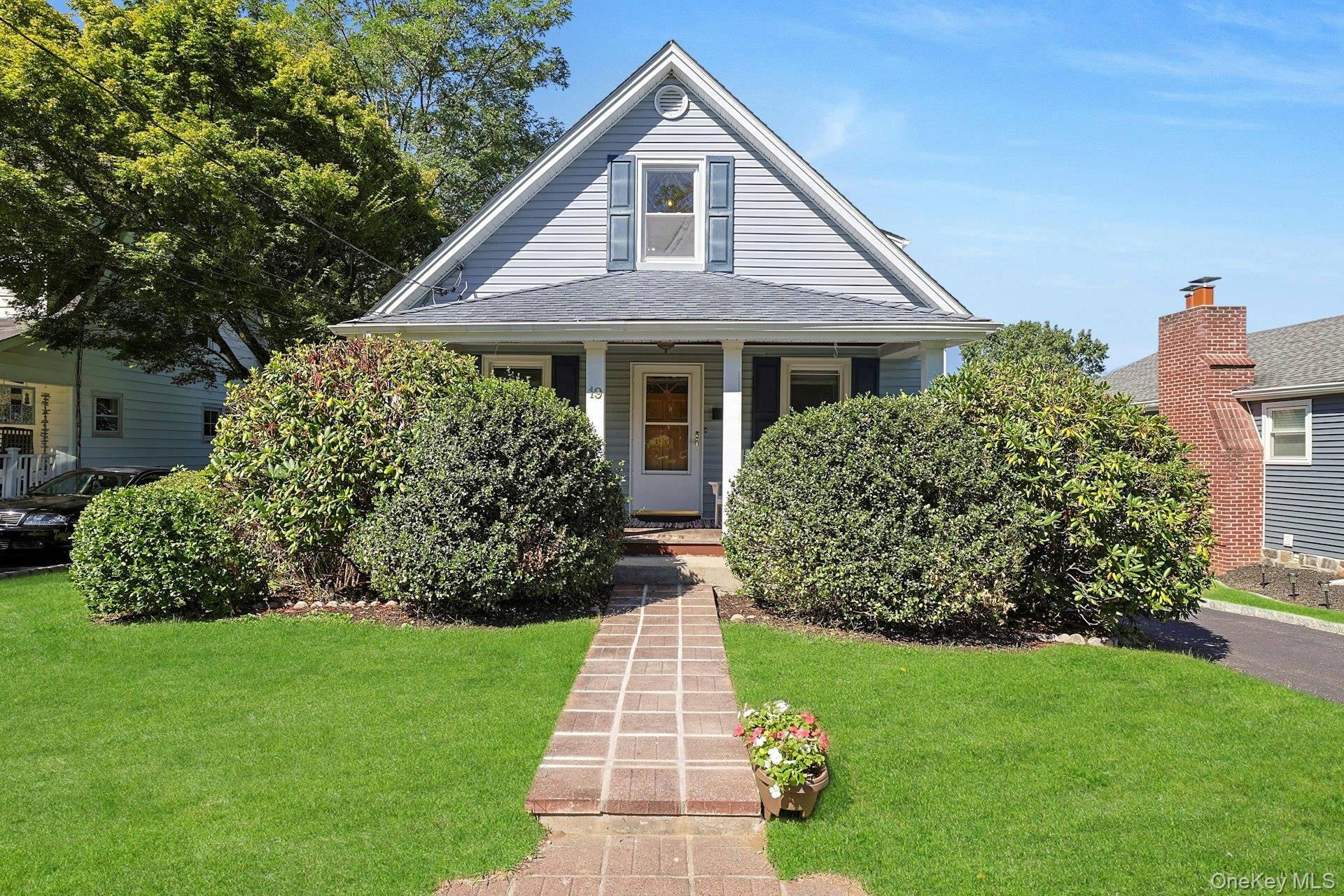 Welcome to this delightful home nestled on a lovely, peaceful street in the village of Ossining.