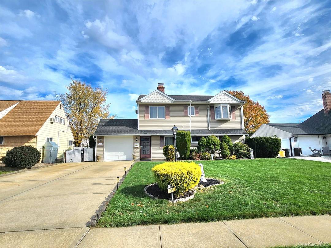 Welcome to this beautifully updated and expanded single family house in the heart of Hicksville !