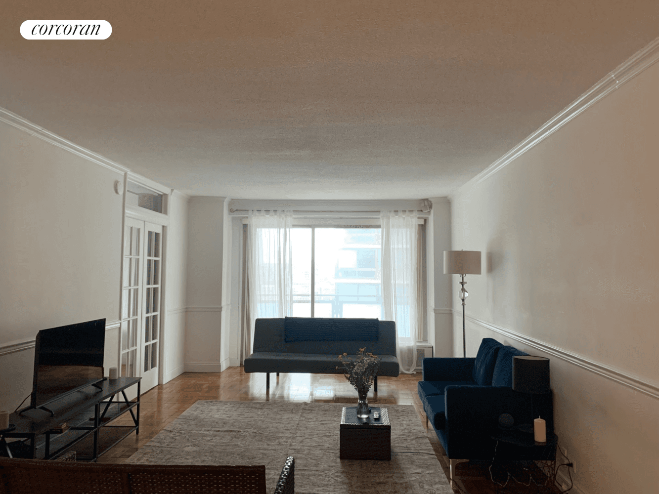 Large and bright two bedroom, one bath corner unit with balcony, where you can sit outside and enjoy your morning coffee with views of the water.