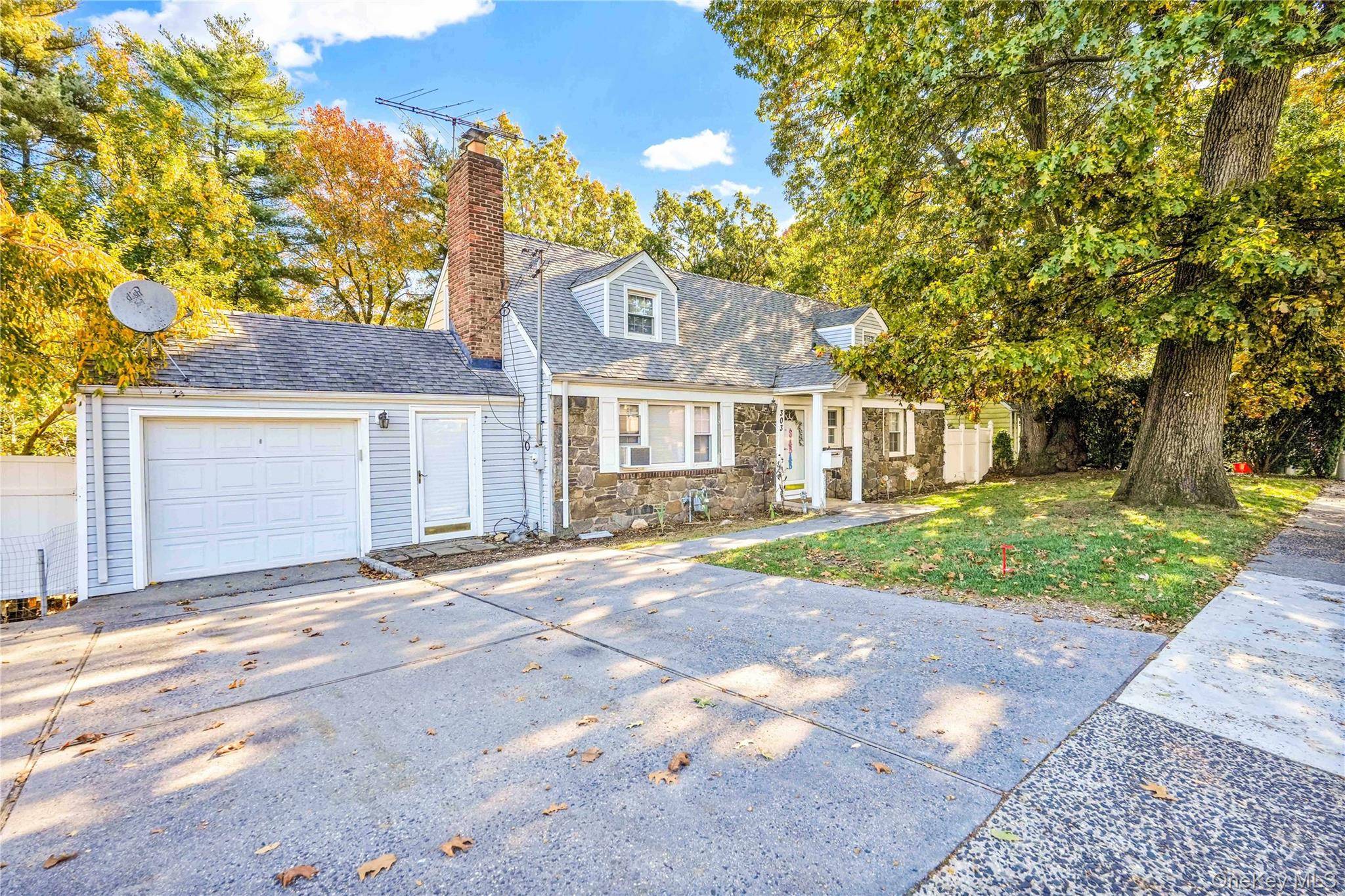 Welcome to this warm and spacious four bedroom, three bath home in West Hempstead, designed with flexibility and comfort in mind.