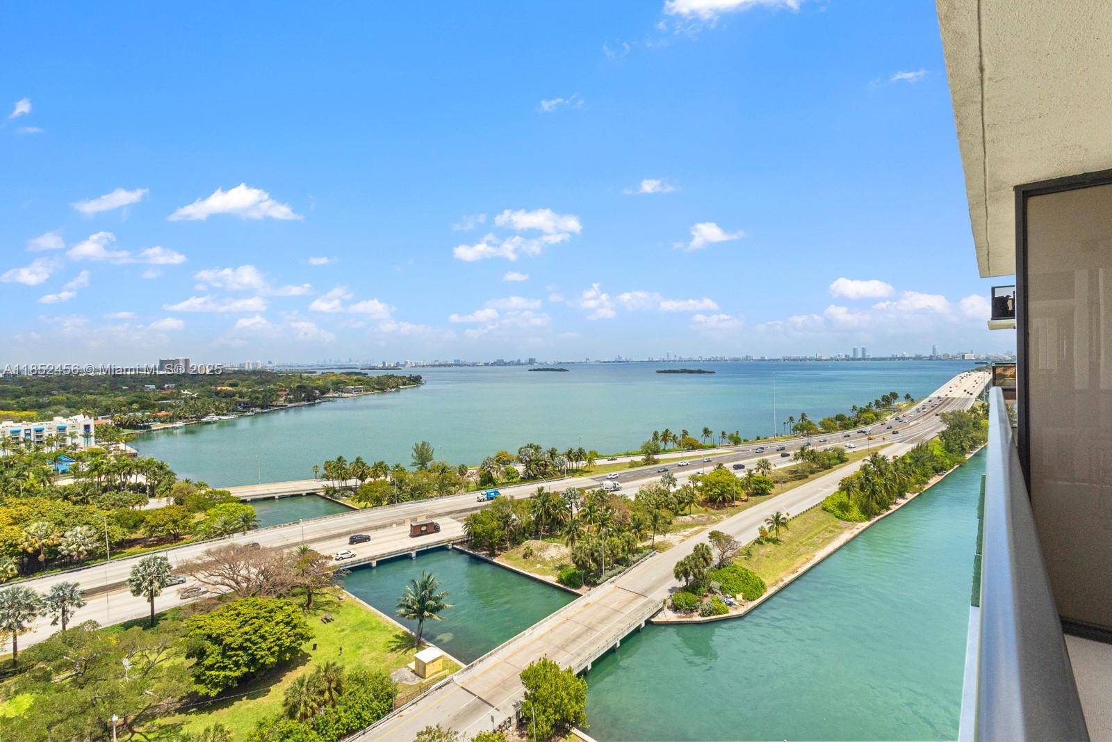 Enjoy breathtaking, panoramic views of Biscayne Bay from this oversized 1 bed 2 bath at The Charter Club, featuring a spacious flex area easily convertible into a second bedroom.
