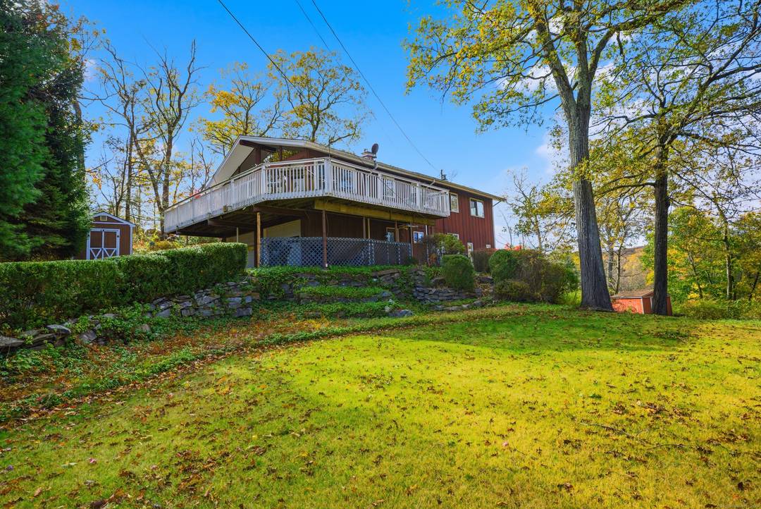 Welcome to 4 Alan Road, A Charming and Inviting Home nestled in a serene gated community called Lake Waubeeka.