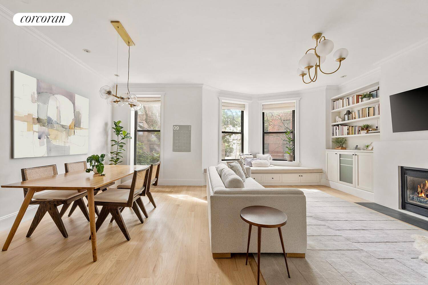 This beautifully appointed 3 bedroom, 2 bathroom condominium encompasses an entire floor nearly 1, 500 square feet of a striking townhouse in central Park Slope.