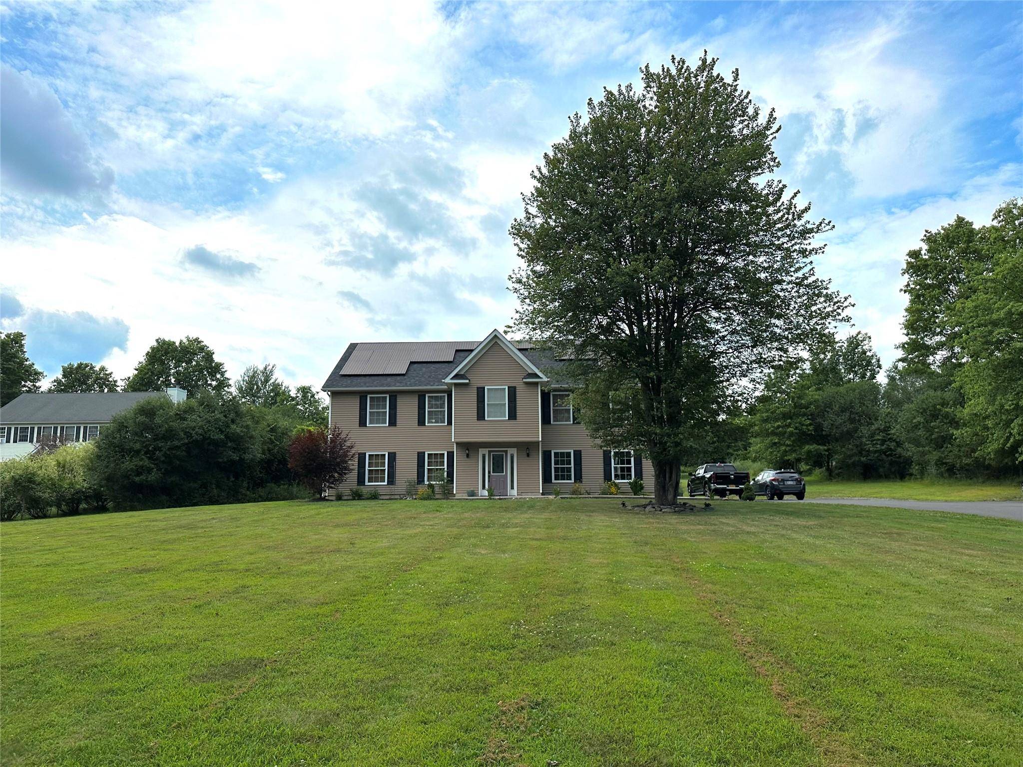 This home comes equipped with solar panels, keeping your electricity bills incredibly low year round.