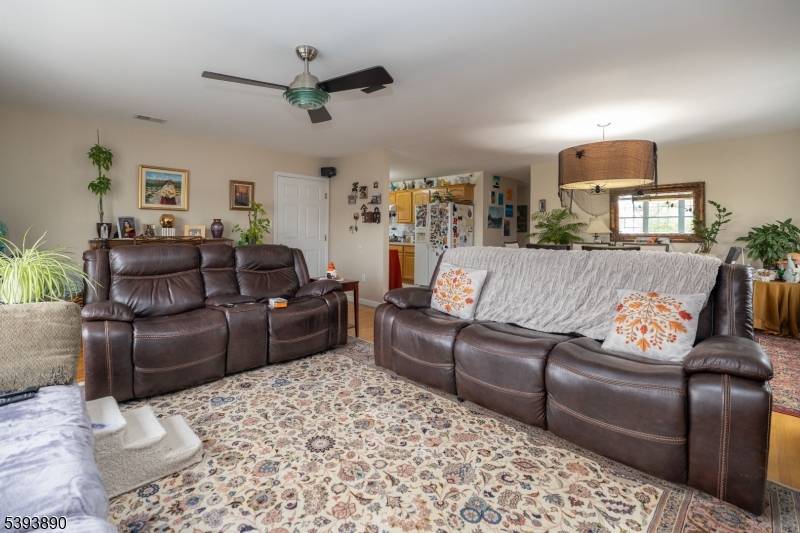 Spacious 2 family home featuring 2 units with 4 bedrooms and 2 full baths each.