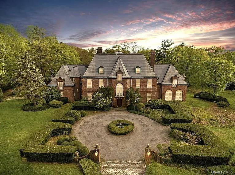 Welcome to 10 Auserehl Court, an exquisite Colonial estate nestled on a serene cul de sac in the heart of Huntington.