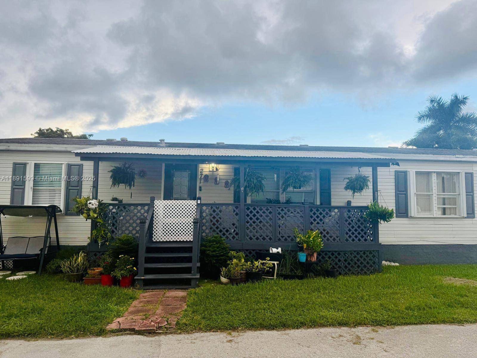 Beautiful corner lot home in the desirable Americana Village community.