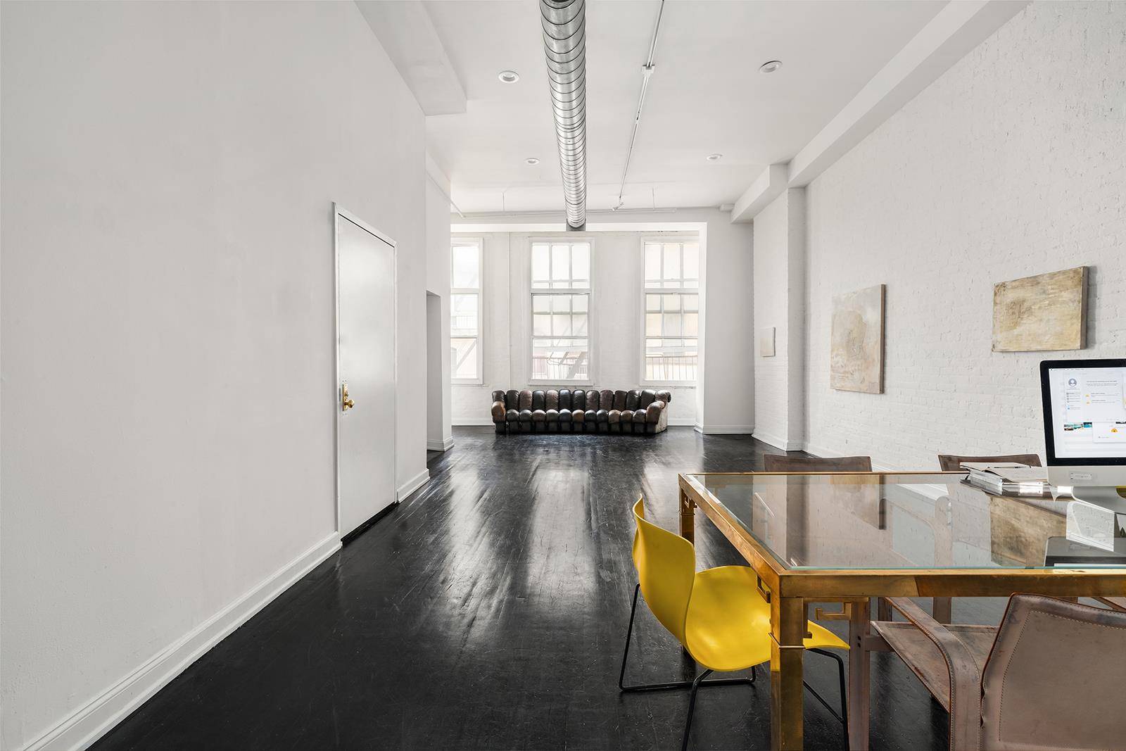 Discover unparalleled sophistication in this exquisite TriBeCa residence at 111 Reade Street, Unit 2.