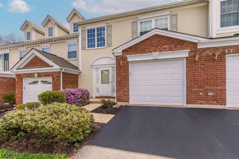 Elegant beautifully maintained townhouse in the sought after Beacon Hill Community.