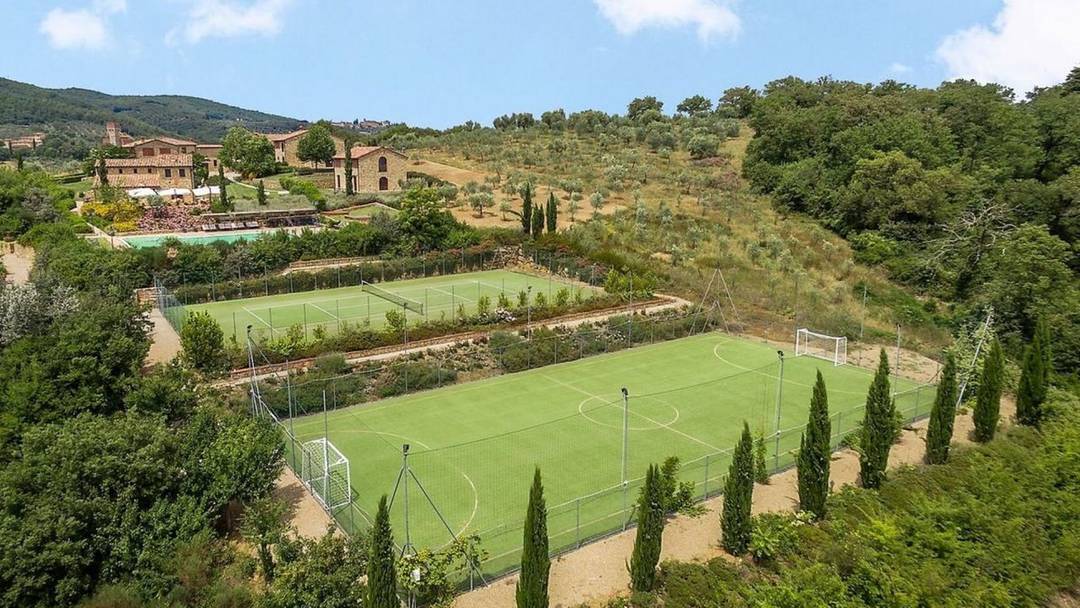 More than 20 stone restored farmhouses placed on 75 he of land with farm estate, vineyard olive grove; swimming pool, pitch, tennis count, golf course