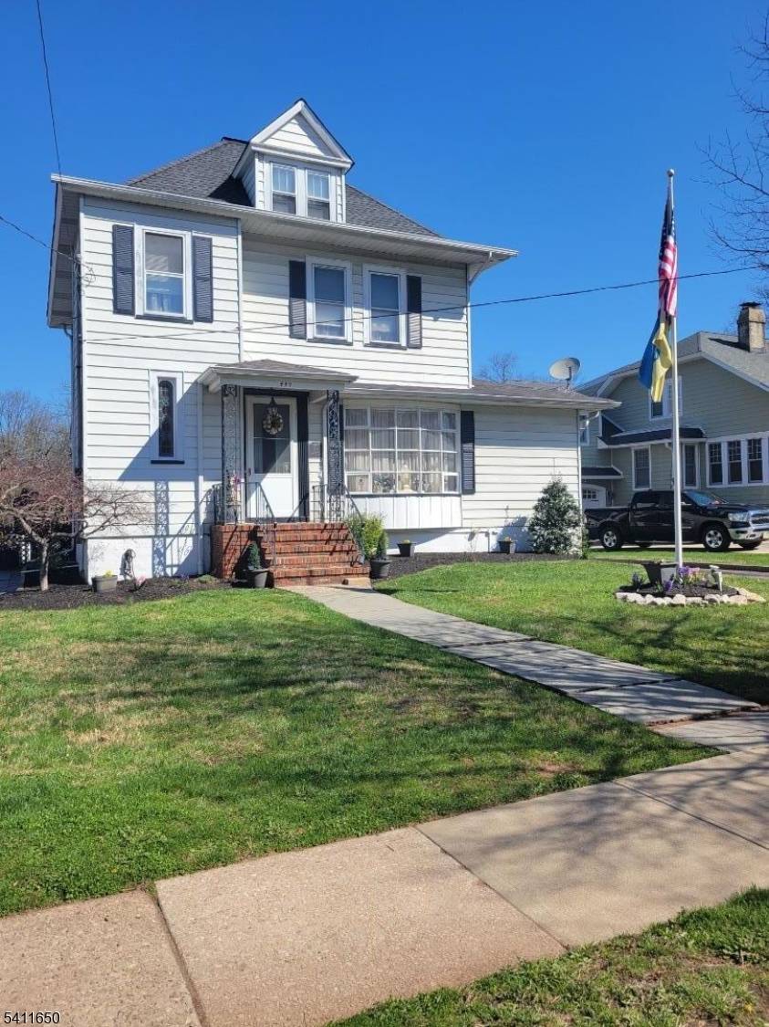 Charming Colonial offering an abundance of living space !