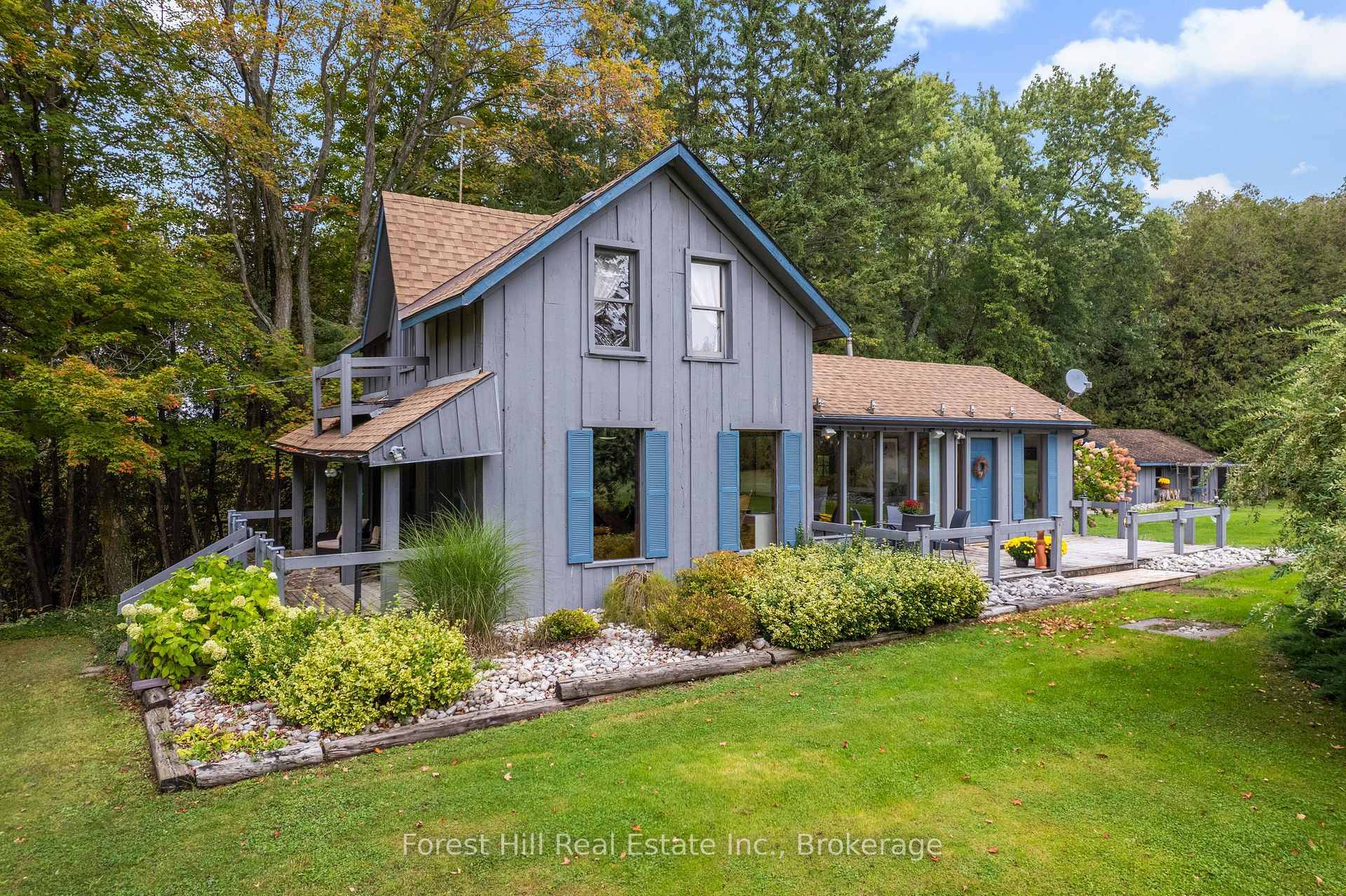 This 1890 log home sits on 23.