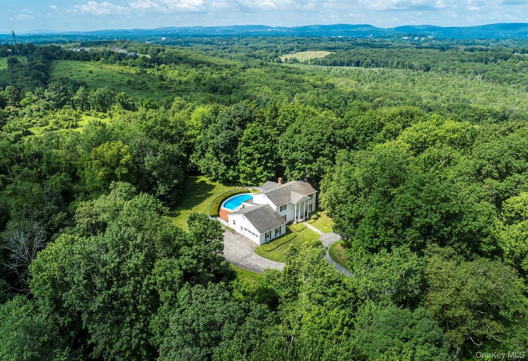 Privately situated at the end of a long driveway is this wonderful Colonial home on 7 acres with an in ground swimming pool and within the highly sought after Arlington ...