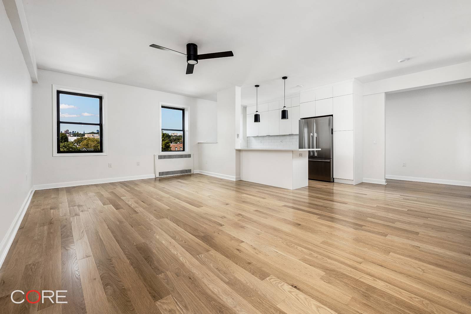 Welcome to Apartment 6K, an exceptionally spacious and airy top floor oasis blending pre war charm with a contemporary and thoughtful top to bottom renovation.
