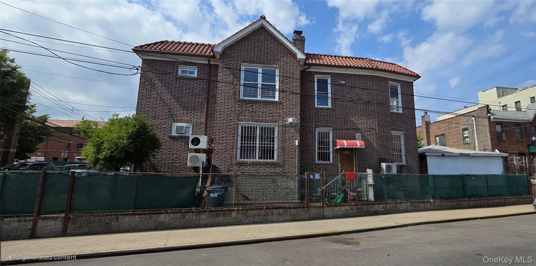 Beautiful 2 family brick corner house located in the heart of the most desirable section of Elmhurst, Queens !