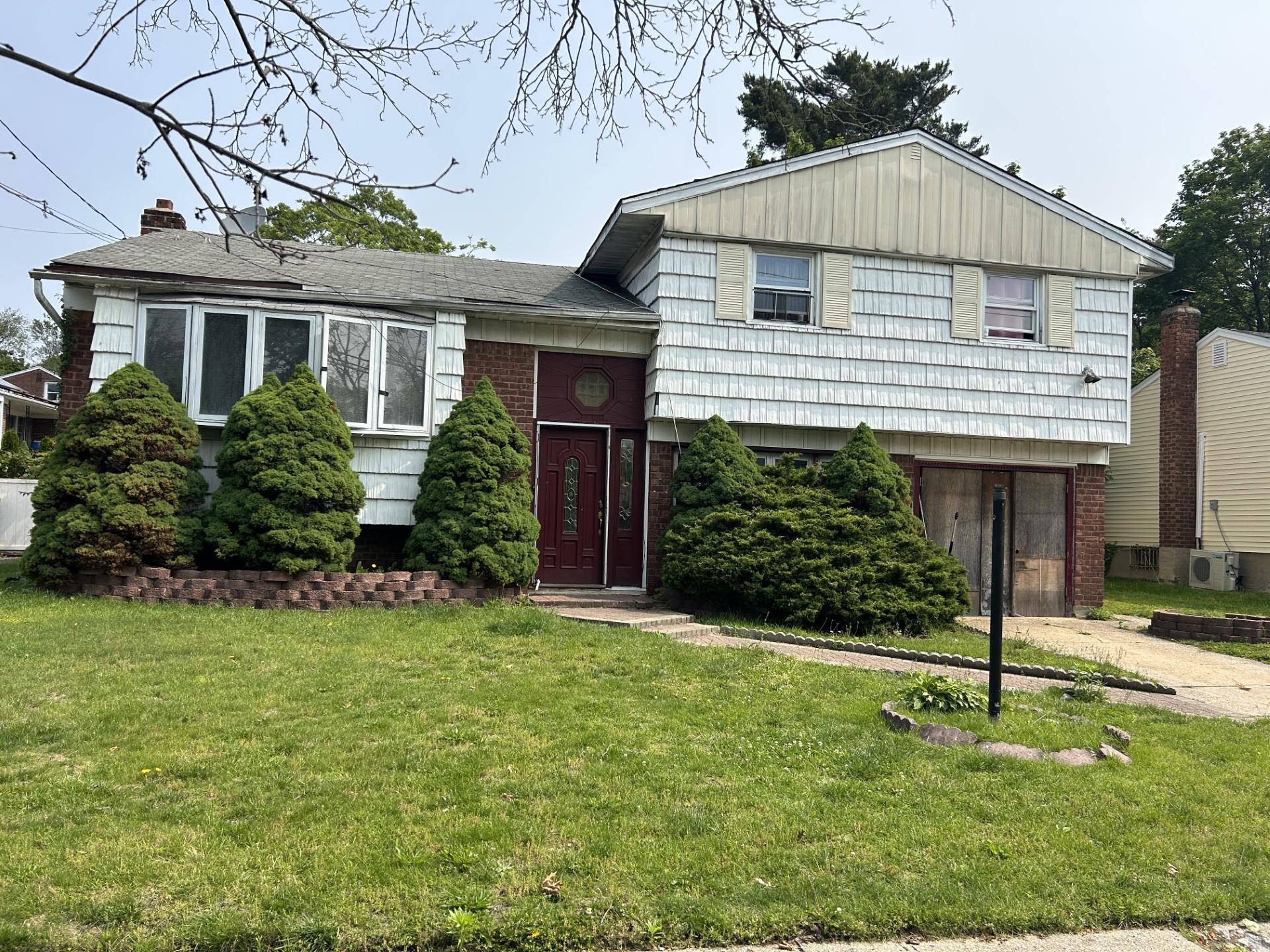 Spacious split level home offers tremendous potential.