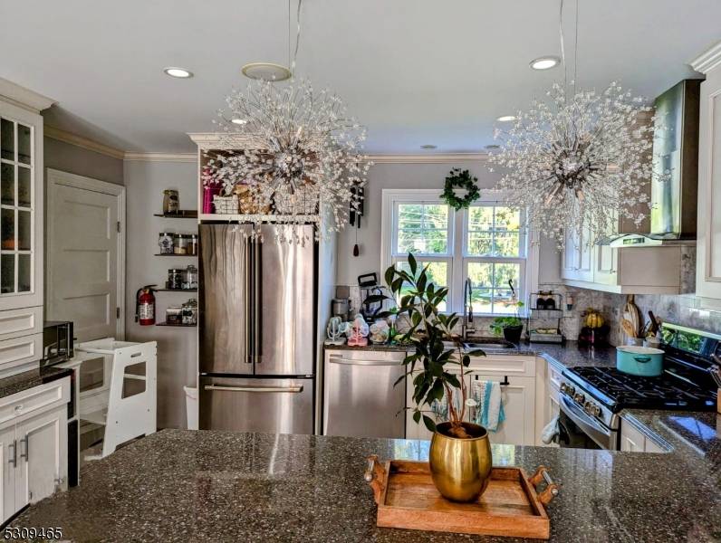This home has been exquisitely renovated and is ready for entertaining !