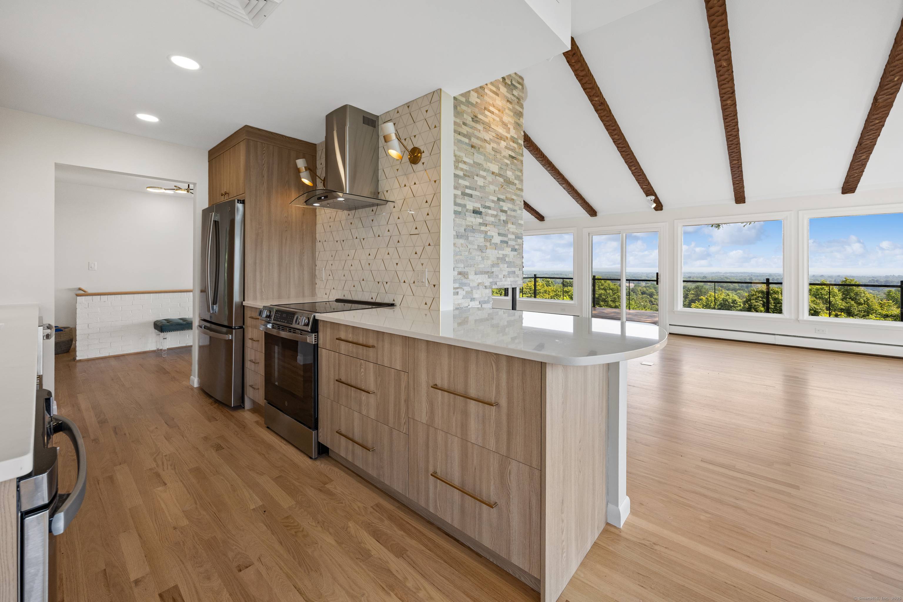 Welcome to 124 Ferncliff Drive where every day starts and ends with jaw dropping Hartford skyline views.