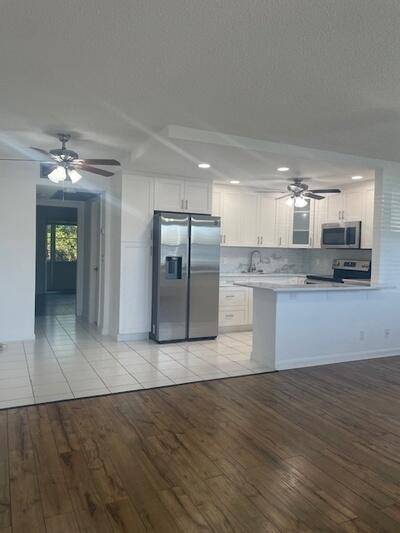 127969 ; Beautifully Renovated 1st Floor Condo in 55 Gated Community Just 95, 000 !