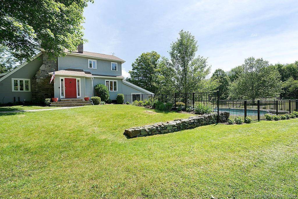 Pristine 1920's barn style 4 bedroom 4 bath home with separate 1 bedroom cottage set on 20 open acres with a stream, ponds heated pool and tennis court.