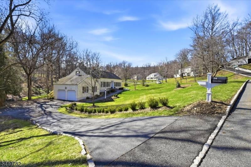 This elegant, oversized Center Hall, Colonial style Raised Ranch is a rarely available, hidden gem.